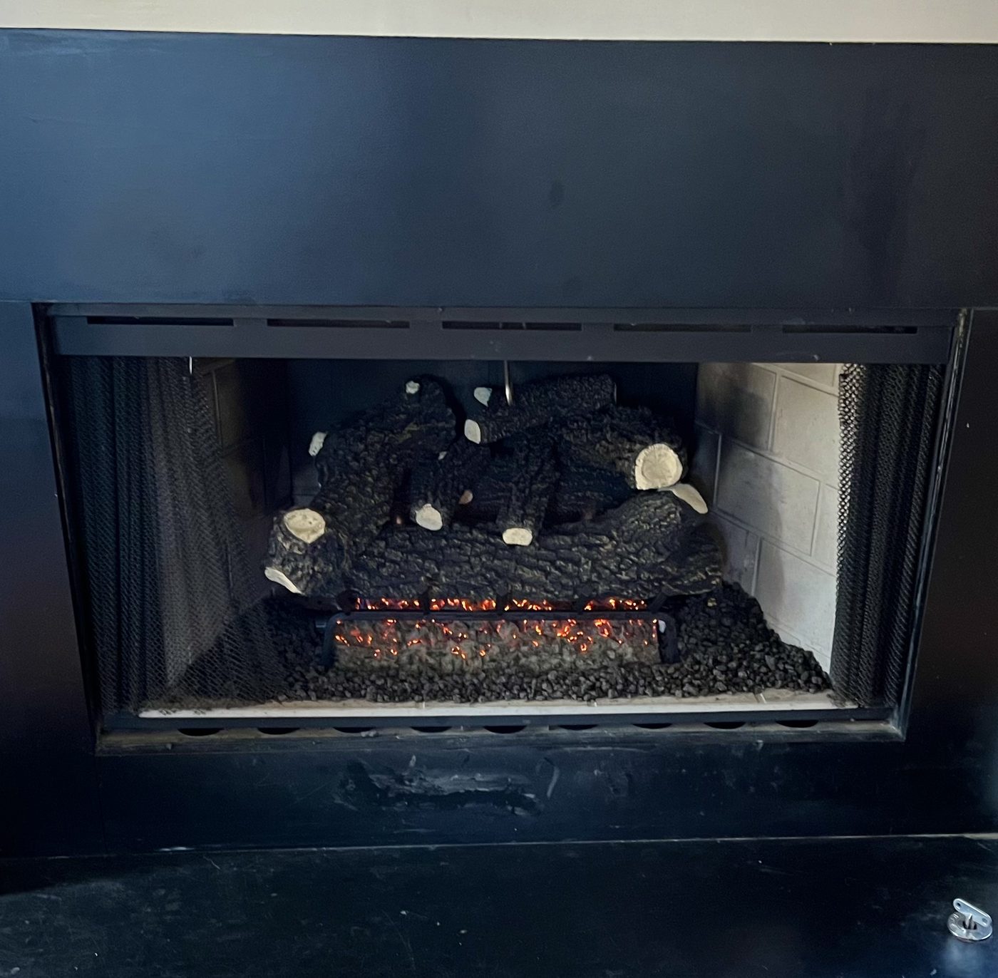 Gas log fireplace installation